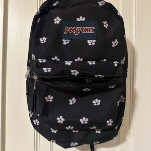 Jansport Black Backpack with White Floral Design
